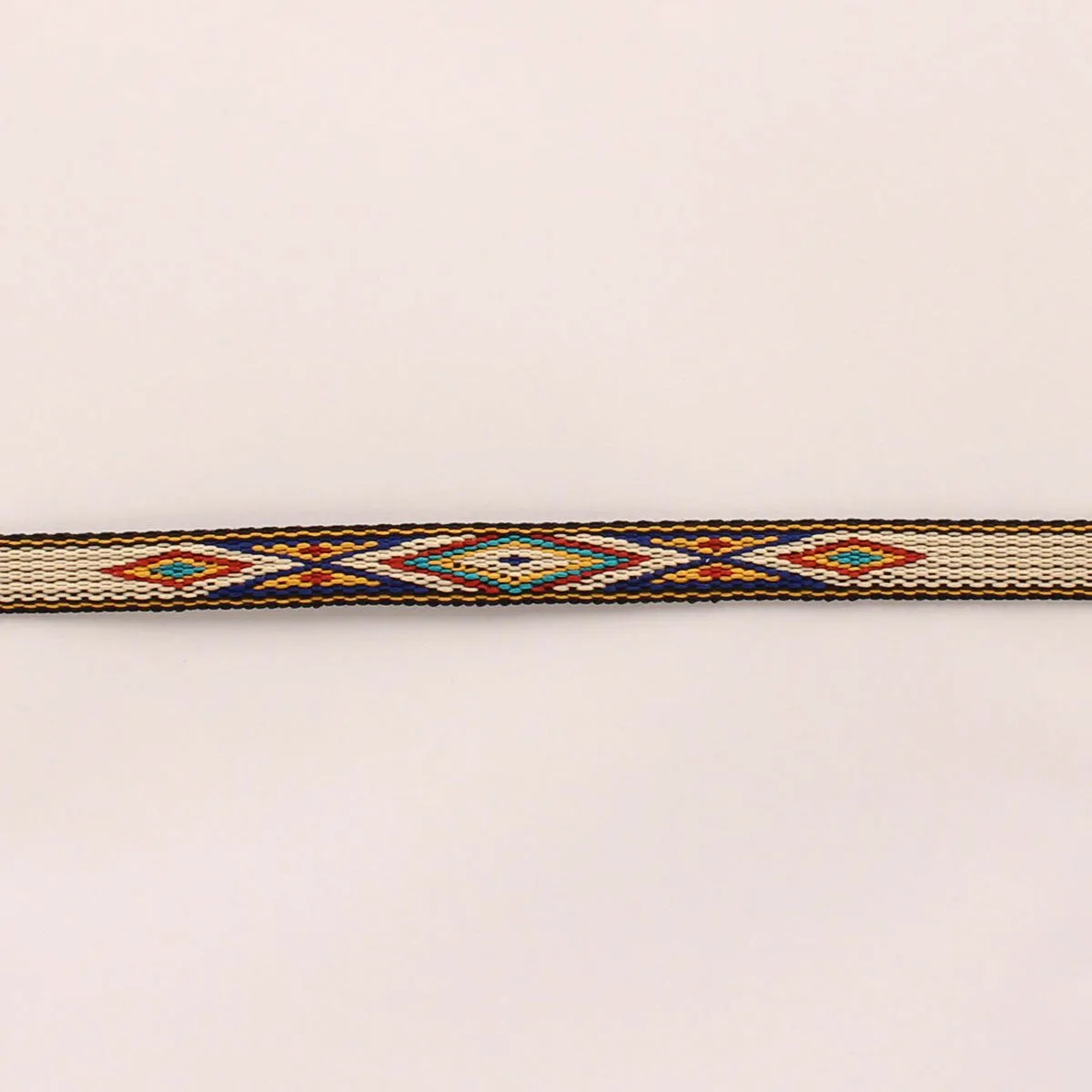 Twister Multi Colored Southwest Pattern Hat Band with White Horse Hair Tassel